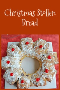 Pin Image: Text title, baked Stollen bread wreath with cherries on top.