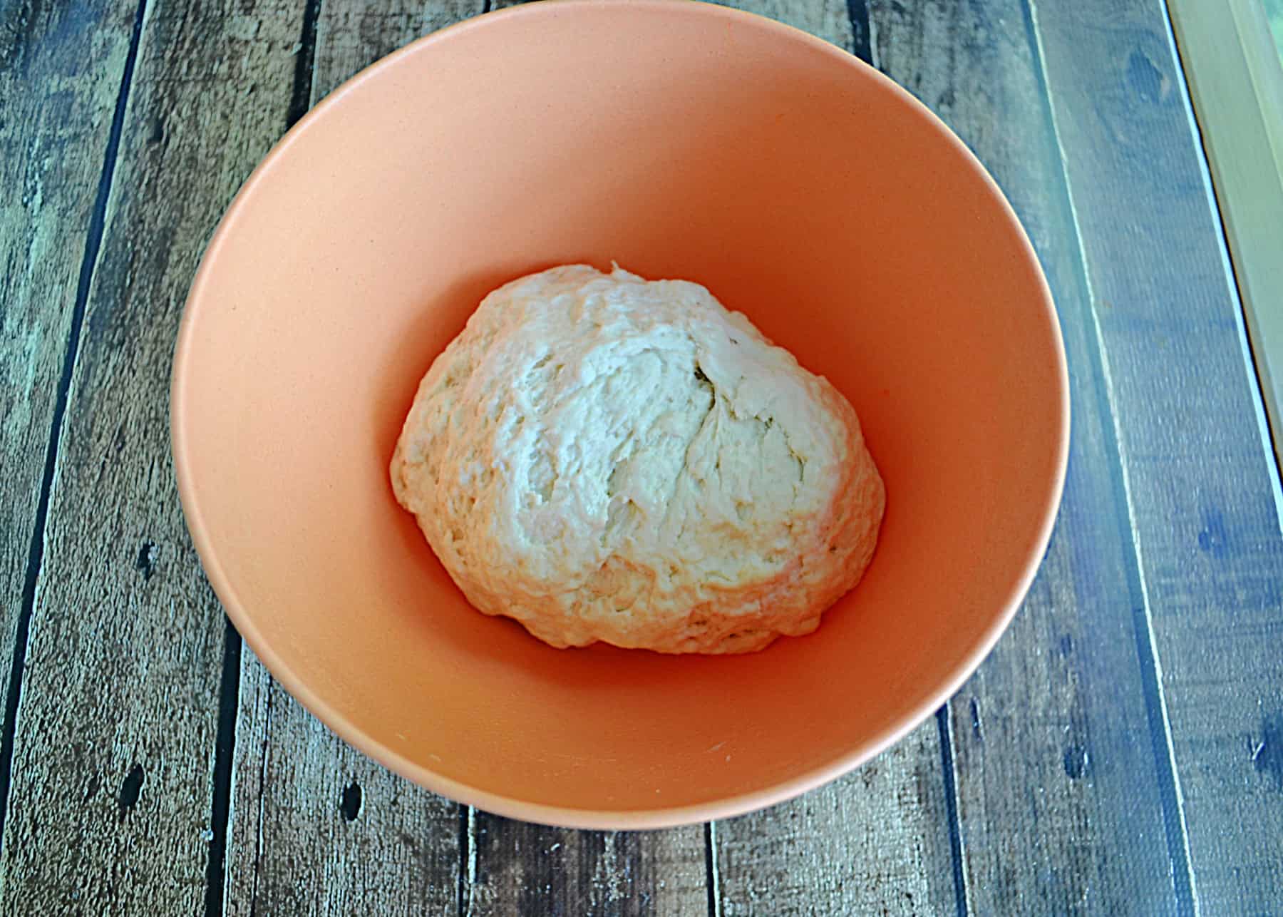 A bowl of dough.