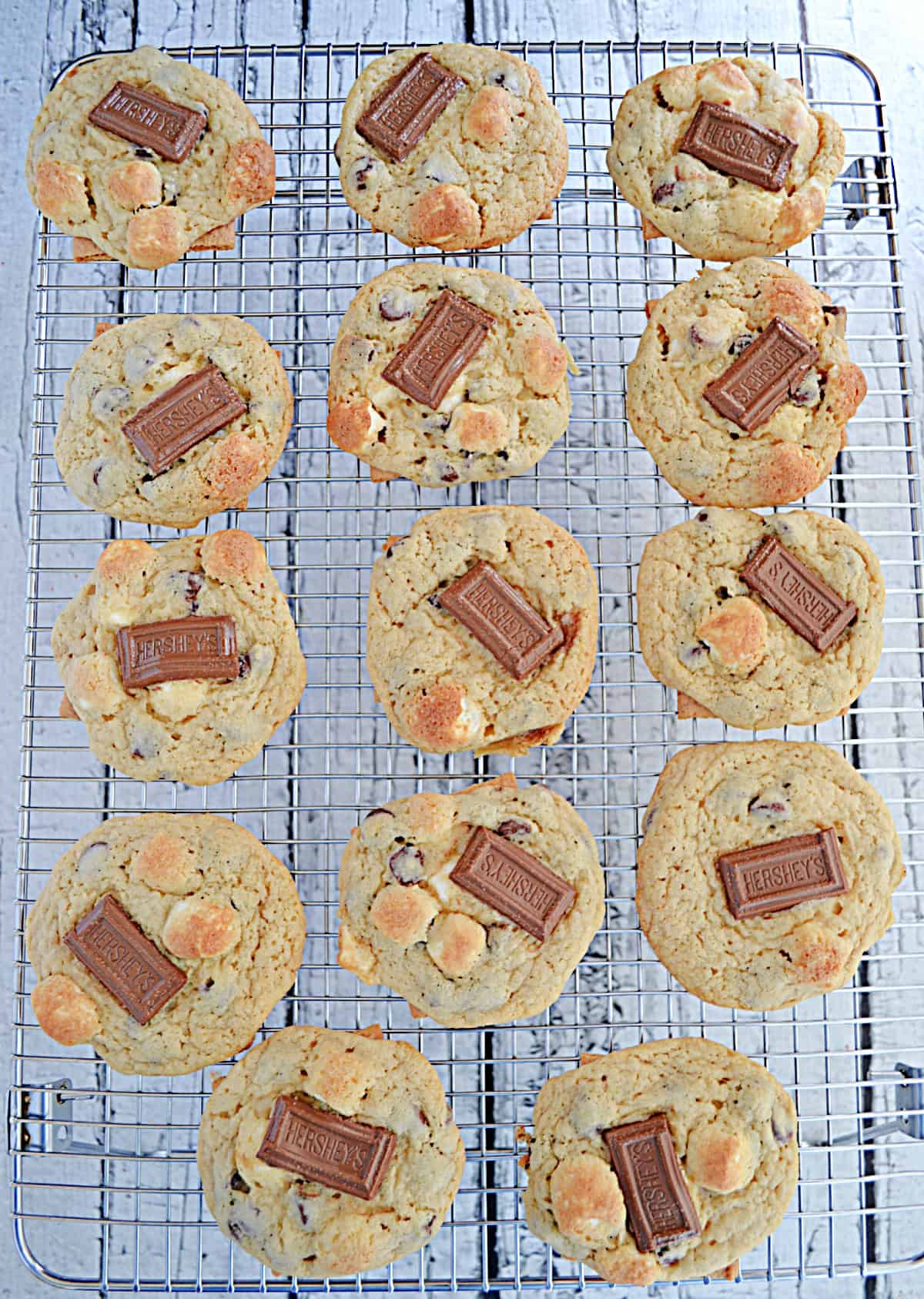 A cooling rack with S'mores Cookies on it.