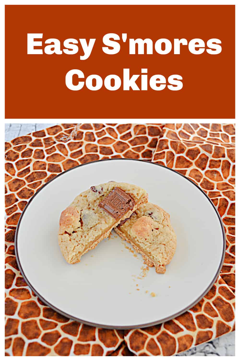 Pin Image: Text title, a plate with a S'mores cookie on it cut in half.