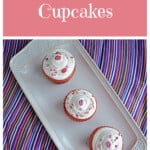 Pin Image: Text title, a platter with three pink velvet cupcakes on it.