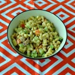Looking for a great summer salad? Try this awesome Loaded Macaroni Salad with vegetables, cheese, bacon, and more!