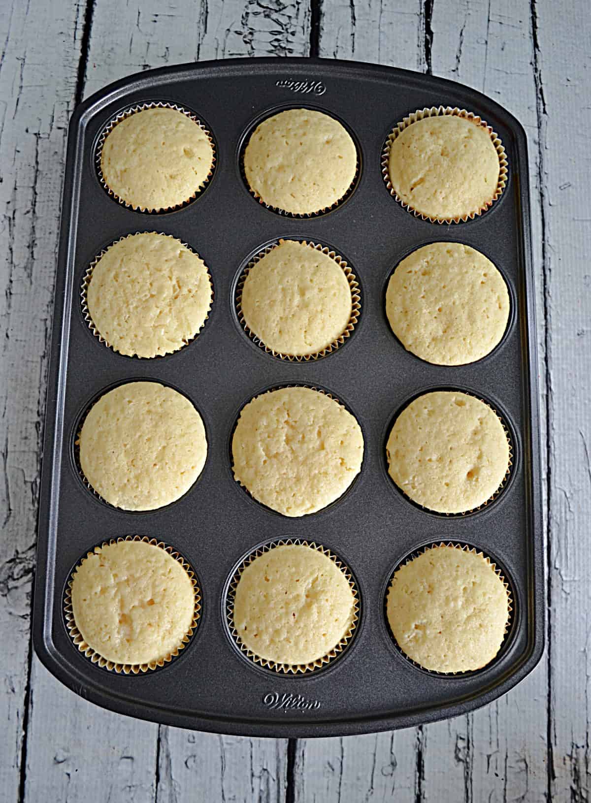 A muffin tin of cupcakes.