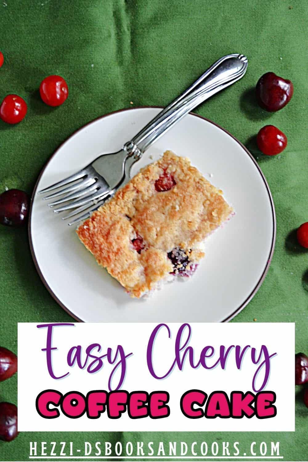 Pin Image: A plate with a piece of cherry coffee cake and a fork with cherries surrounding the plate, text title.