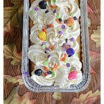 Pin Image: A loaf pan with cake and frosting, text title.