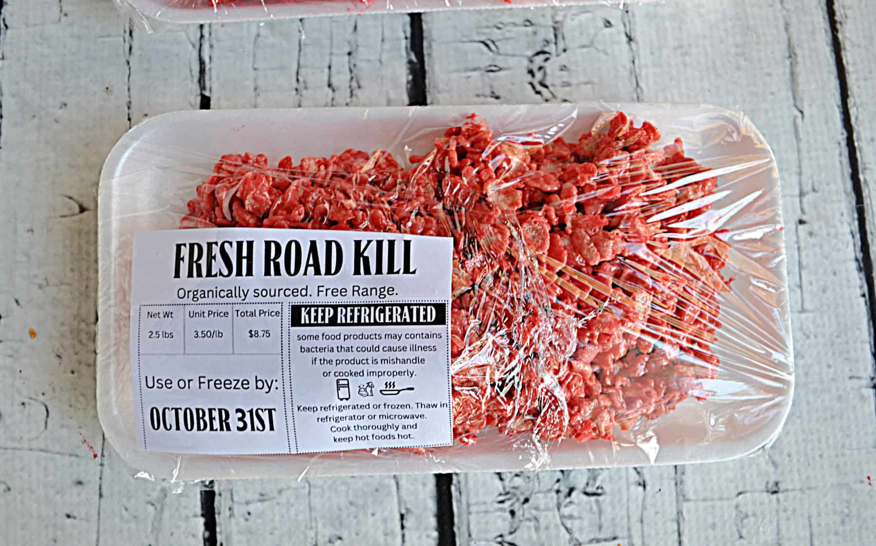 A tray of red velvet Rice Krispies Treats packaged with a label saying "Fresh Road Kill".